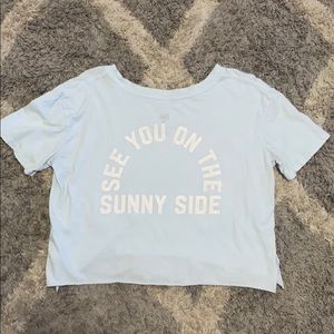 Size medium women’s cropped billabong t-shirt.